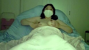 i'm a horny asian milf masturbatin before bed with my big tits out