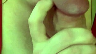 a young woman performs a blowjob on a big cock in this video