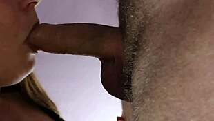 She gives a gentle slow blowjob to her lover in the bedroom