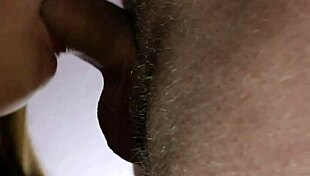 She gives a gentle slow blowjob to her lover in the bedroom