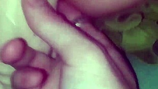 she fingers her wet pussy as i fill her with a gigantic dildo