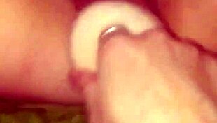 she fingers her wet pussy as i fill her with a gigantic dildo