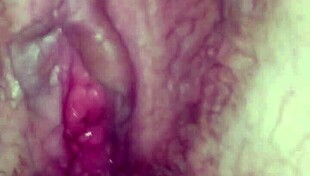 she fingers her wet pussy as i fill her with a gigantic dildo