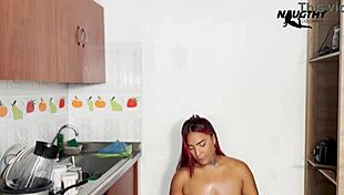 Girl with huge ass feels intense pleasure masturbating in the kitchen