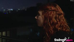Redhead babe joins swingers group in stockings for playful kissing session