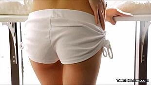 in this softcore solo scene, hot teen tini fingers her pussy to orgasm