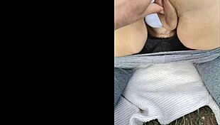 i masturbate in the field, touching my ass and pussy