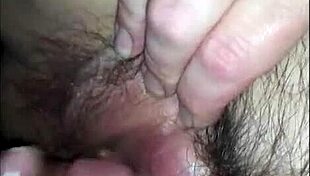 In this homemade video, he passionately plays with her hairy pussy up close.