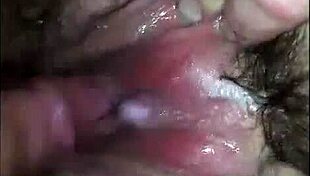 In this homemade video, he passionately plays with her hairy pussy up close.