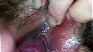 In this homemade video, he passionately plays with her hairy pussy up close.