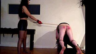 feeling the intense punishment of hard caning and spanking
