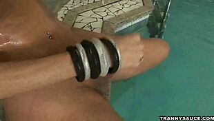 Sexy Blonde Tranny Babe Enjoys Solo Time Tugging Poolside