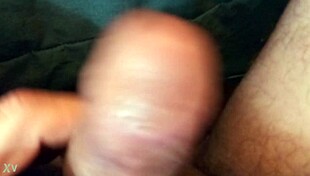 the guy plays with his cock in a casual way.