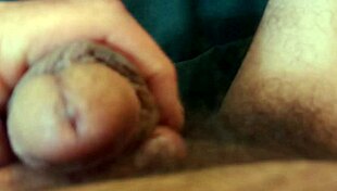 the guy plays with his cock in a casual way.