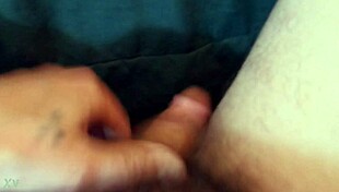 the guy plays with his cock in a casual way.