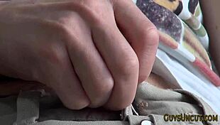 Watch this uncut hunk stroke his big cock!