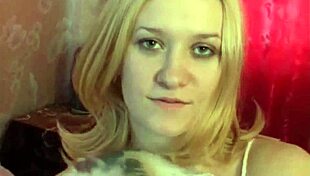 Hot blonde masturbates pussy while sucking dildo.