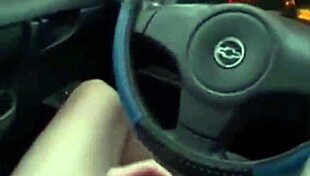 Guy jerks off while driving his car.