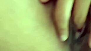 Sexy latina masturbates her wet hairy vagina on the bed