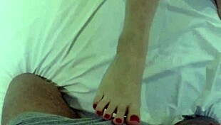 young woman playfully sucking and rubbing to tease