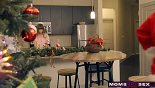 Petite helpers suck and ride big cocks in Christmas threesome