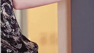 Redhead Elle Alexandra Undresses Seductively