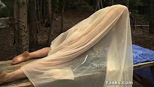 Tattooed Sage feels intense pleasure as she fingers her hairy clit during solo masturbation.