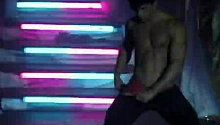 Handsome brazilian stripper rips clothes in seductive striptease