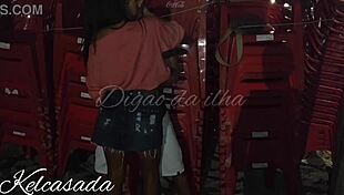 Couple caught kissing and flashing on the beach.