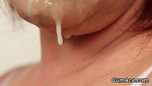 feisty idol receives cum load on face while sucking jizz in blowbang bukkake.