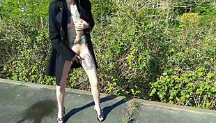 Whore gets dirty on a public street. She pisses and uses toys for outdoor masturbation.