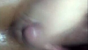 milf gives a handjob to the little guy in this steamy scene