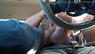 Driving down the road, he gets a blowjob from a guy with socks on his black cock