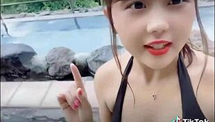 japanese woman dances sexily with big boobs