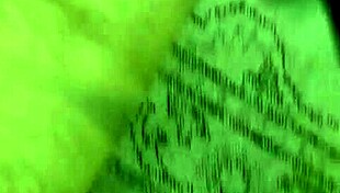 Fitness model stretches in yoga session with director's guidance