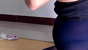 sexy mature woman uses vibrator on wet pussy while watching porn alone.