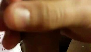 the amateur guy masturbates his big cock in front of the camera