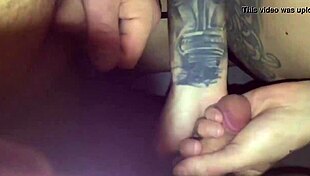 TATTOED CHICK SUCKS STRANGER IN VIDEO BOOTH