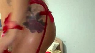 ALINA MODELISTA TEASING IN RED LINGERIE WITH OIL, SHOWING OFF HER BIG ASS