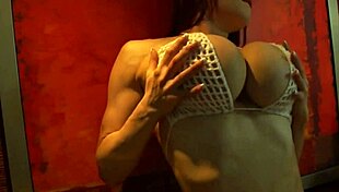 So, this bodybuilder rocks a tiny bikini with her fake silicone tits.
