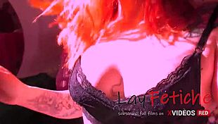 Tattooed redhead exhibitionist rides solo under the sun, flaunting natural tits! 😍