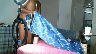 solo african american milf strips naked and plays with her saggy tits and big boobs