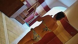 Hungarian babe flashes tits and masturbates at the spa desk!