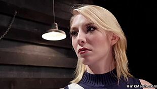 How does this masochistic blonde slave get trained in the dungeon?