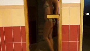 Hungarian babe flashes tits and masturbates at the spa desk!