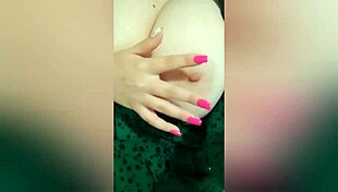 young beauty plays with her breasts