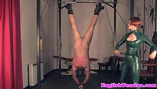 Watch This Femdom Trample Her Slave in Heels After Whipping Him!