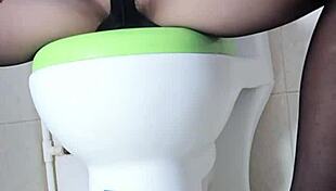 Big breasted woman masturbates in toilet, is your cock hard