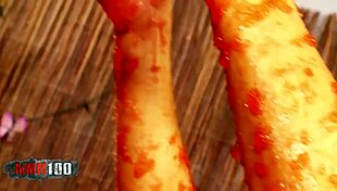 Three horny lesbians splash in a plastic pool, covering each other with messy tomato sauce