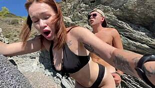 hot brunette passionately fucks stranger sloppy on public beach